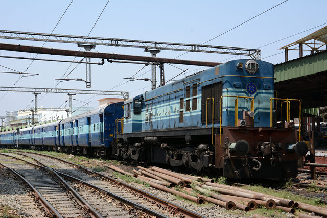 Indian train tracks image by Joe Ravi (via Shutterstock).