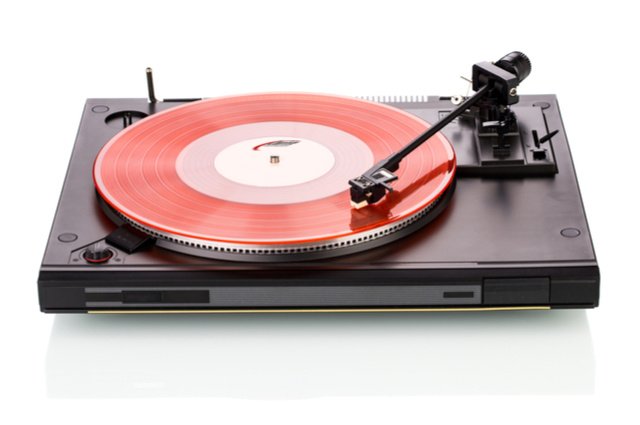 Industrial cleaning songs record player image by Indigolotos (via Shutterstock).